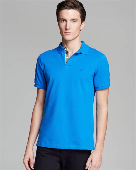 blue burberry polo